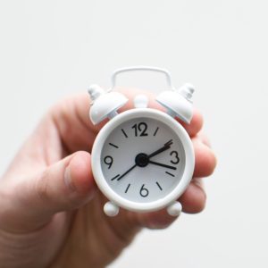 Clock in hand